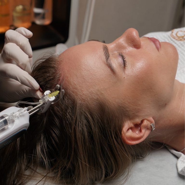 a girl takin hair loss treatment